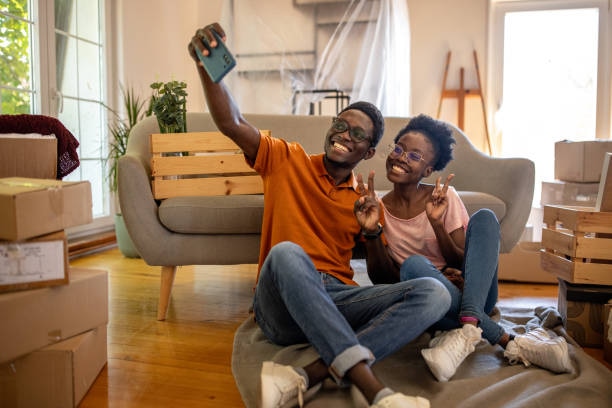 Young couple relaxing in their new apartment after moving in